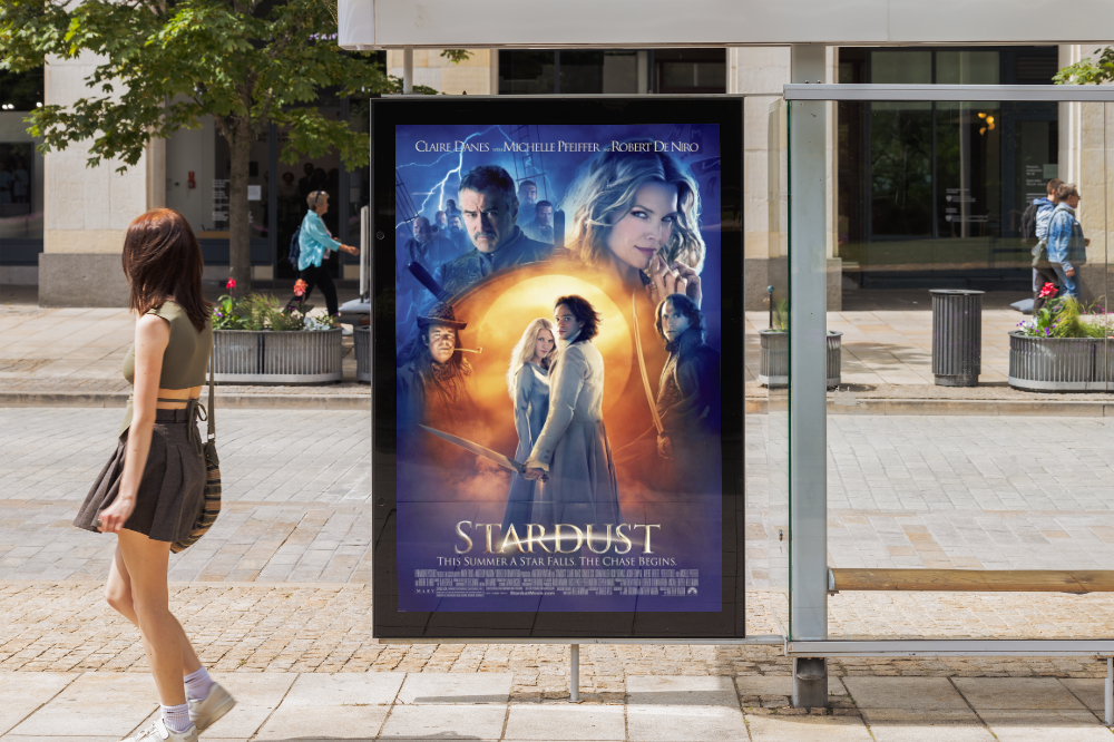 A movie poster at a busstop. The poster is for the movie Stardust.