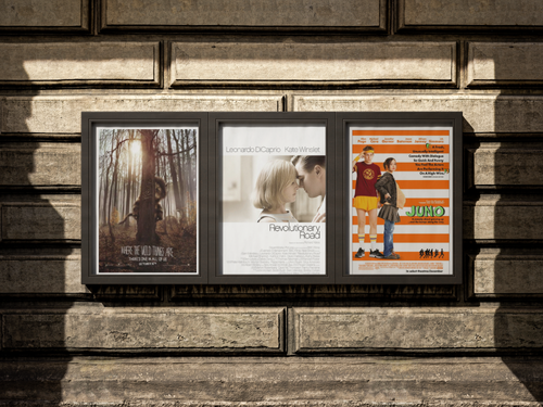 Three movie posters on a wall, from left to right: Where the Wild Things Are, Revolutionary Road, Juno